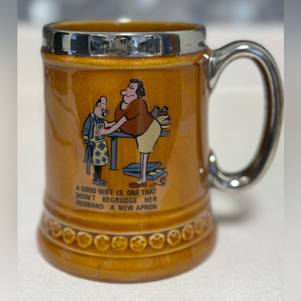 MCM CERAMIC BEER STEIN MUG A GOOD WIFE WILL NOT BEGRUDGE HER HUSBAND A NEW APRON